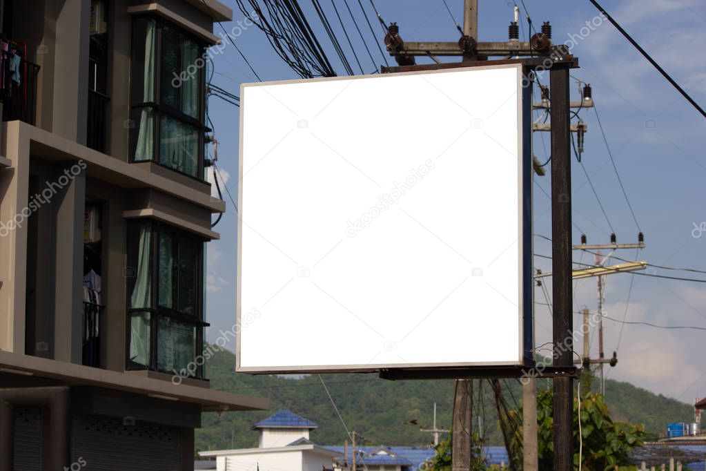 White blank billboard or signboard on street side for mock up presentation.