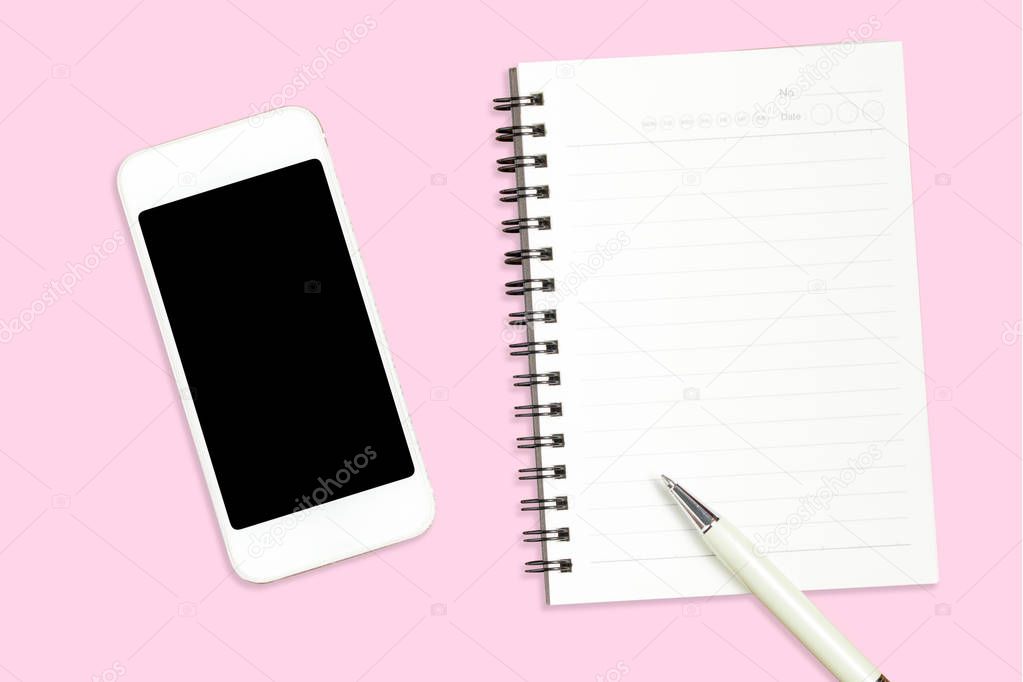 Smartphone, note, pen on pink background for mock up.