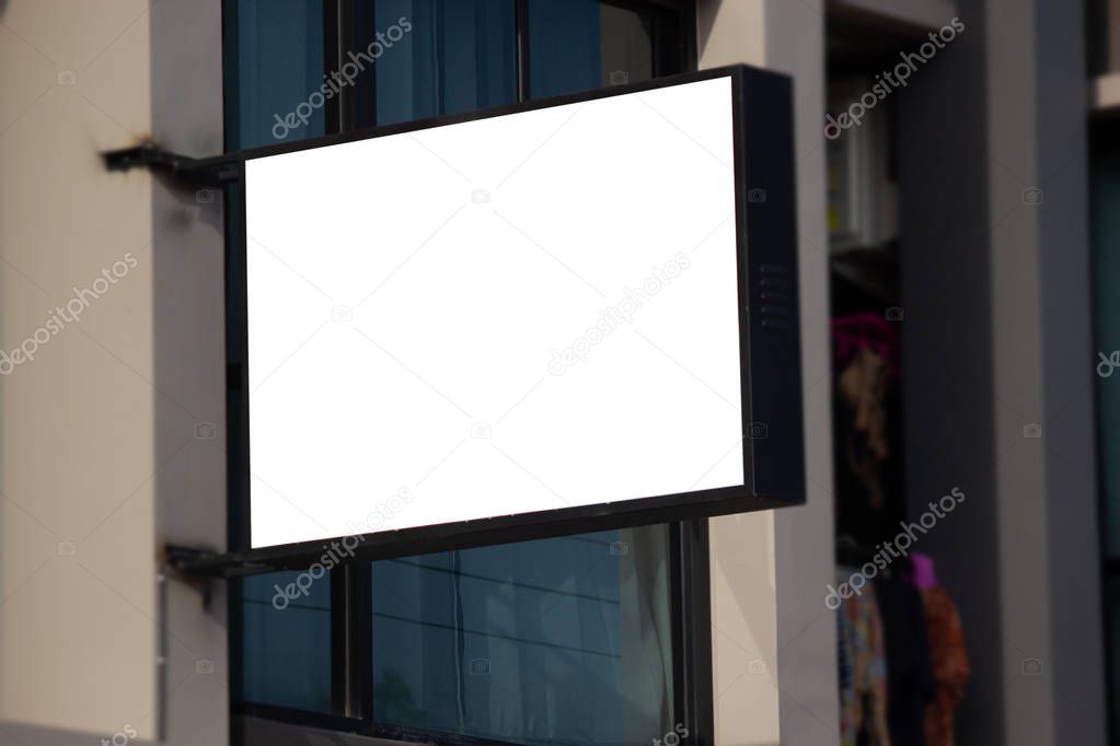 White blank billboard or signboard on street side for mock up presentation.