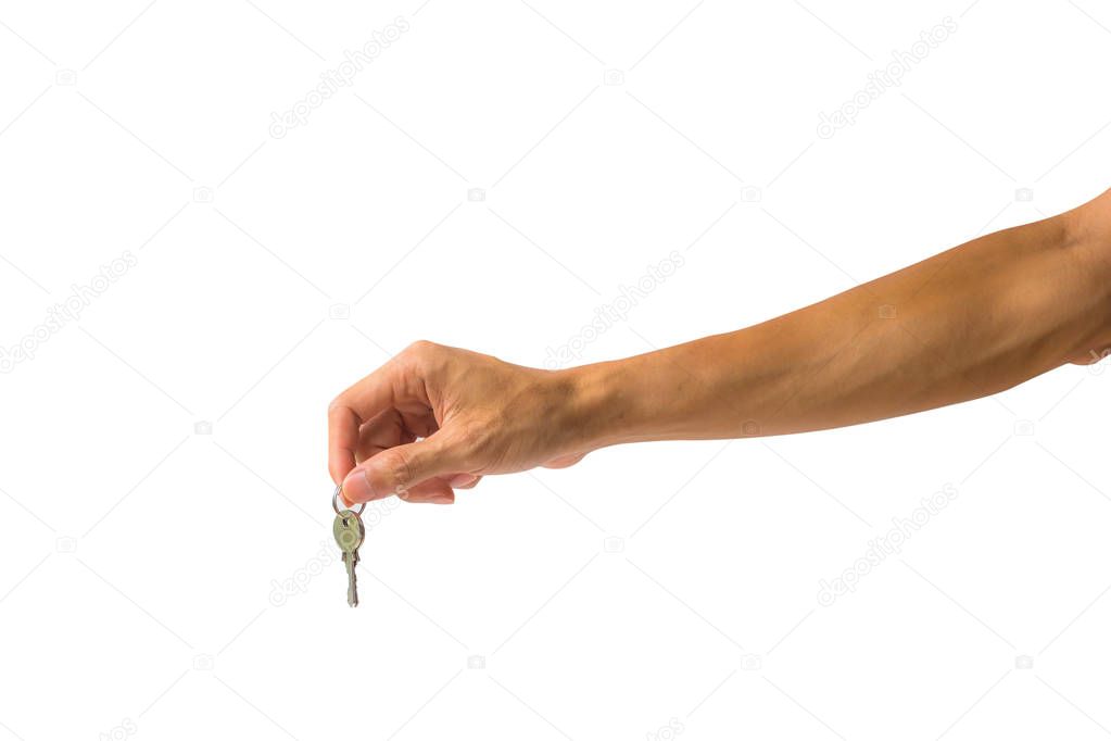 Close-up a man hand holding silver key against white background include clipping path easy to cutout.