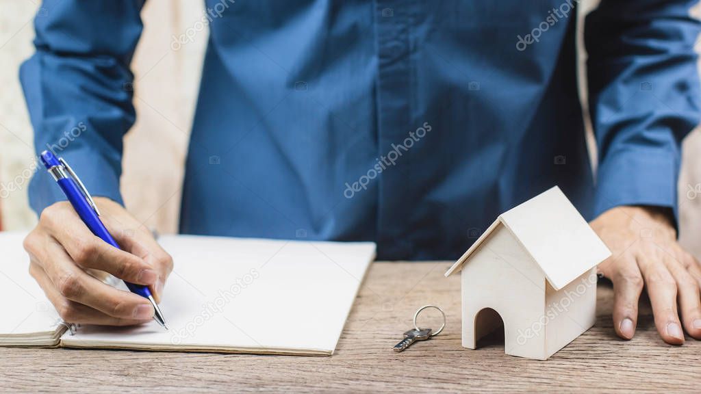 Home loan, Reverse mortgage concept. Estate agent sign the certi