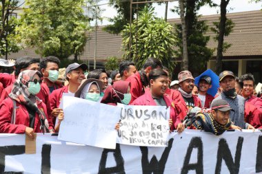 23 Eylül 2019, Gejayan, Endonezya: Gejayan Çağrısı (Endonezyaca: Gejayan Memanggil) barış gösterisine Yogyakarta 'daki çeşitli kampüslerden öğrenciler katıldı..