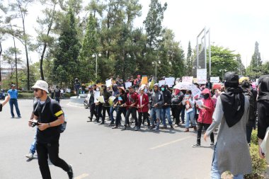 23 Eylül 2019, Gejayan, Endonezya: Gejayan Çağrısı (Endonezyaca: Gejayan Memanggil) barış gösterisine Yogyakarta 'daki çeşitli kampüslerden öğrenciler katıldı..