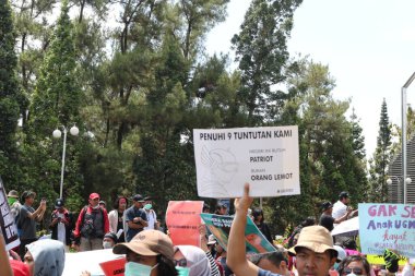 23 Eylül 2019, Gejayan, Endonezya: Gejayan Çağrısı (Endonezyaca: Gejayan Memanggil) barış gösterisine Yogyakarta 'daki çeşitli kampüslerden öğrenciler katıldı..