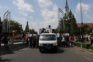 23 Eylül 2019, Gejayan, Endonezya: Gejayan Çağrısı (Endonezyaca: Gejayan Memanggil) barış gösterisine Yogyakarta 'daki çeşitli kampüslerden öğrenciler katıldı..