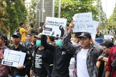 23 Eylül 2019, Gejayan, Endonezya: Gejayan Çağrısı (Endonezyaca: Gejayan Memanggil) barış gösterisine Yogyakarta 'daki çeşitli kampüslerden öğrenciler katıldı..