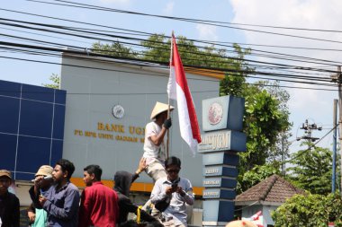 23 Eylül 2019, Gejayan, Endonezya: Gejayan Çağrısı (Endonezyaca: Gejayan Memanggil) barış gösterisine Yogyakarta 'daki çeşitli kampüslerden öğrenciler katıldı..