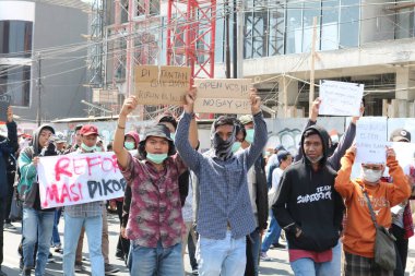 23 Eylül 2019, Gejayan, Endonezya: Gejayan Çağrısı (Endonezyaca: Gejayan Memanggil) barış gösterisine Yogyakarta 'daki çeşitli kampüslerden öğrenciler katıldı..