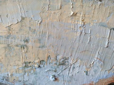  Beyaz noktalar mavi arka planda palet bıçağıyla lekelenmiş. 