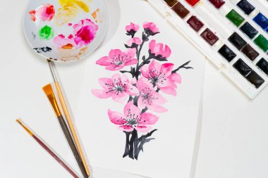 Pembe çiçeklerin suluboya resmine tepeden bak