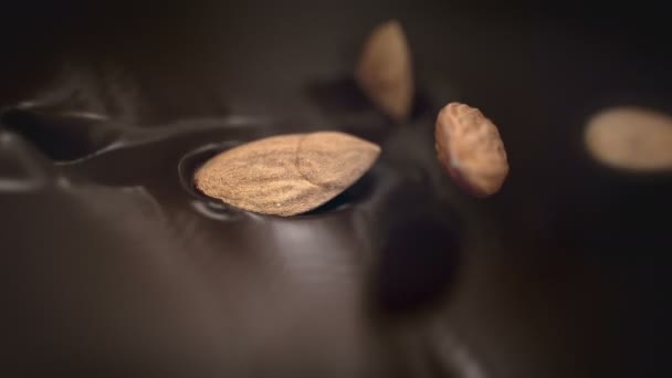 Nueces Almendras Cayendo Chocolate Líquido Super Cámara Lenta — Vídeos de Stock