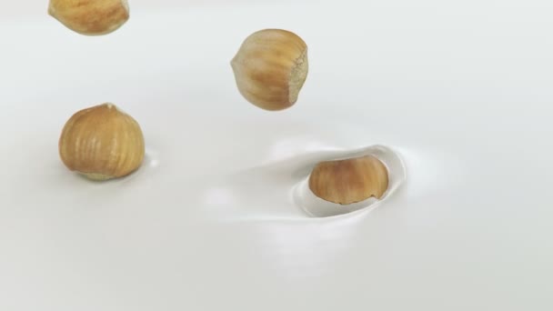 Nocciole Che Schizzano Nella Crema Liquida Super Slow Motion — Video Stock