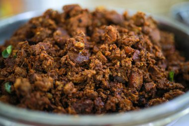 Hint baharatlı biftek kızartması Kerala, Hindistan. garnitürlü ghee pilavı, appam, parotta, puttu, ekmek ve chappathi, Kerala mutfağı, hindistan cevizli bufalo rosto / et biberi kızartması. Hindistan baharat pişirme,