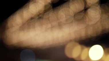Bulanık Arkaplan Bokeh Noel ve Yeni Yıl ışıklarına bak .