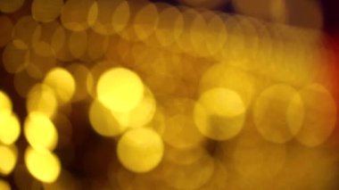 Nettipattam, arka plan için soyut bokeh siyah arkaplanı bulanıklaştırdı, parlayan parlak bokeh dağıldı ve altın ışıltılar arka planda.