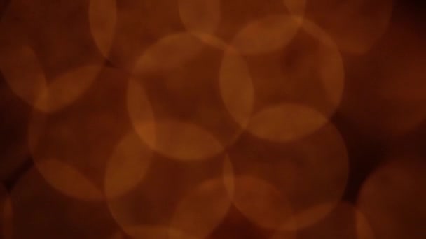 Nettippattamは背景のための抽象的なボケ黒の背景をぼかした 輝く明るいボケと黄金の輝きの背景 — ストック動画