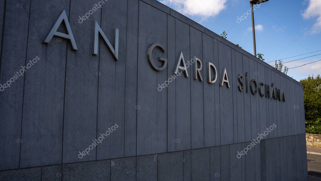 Wexford Town, County Wexford, Ireland, 25th August 2025. Sign on Wall of Wexford Town Garda Station