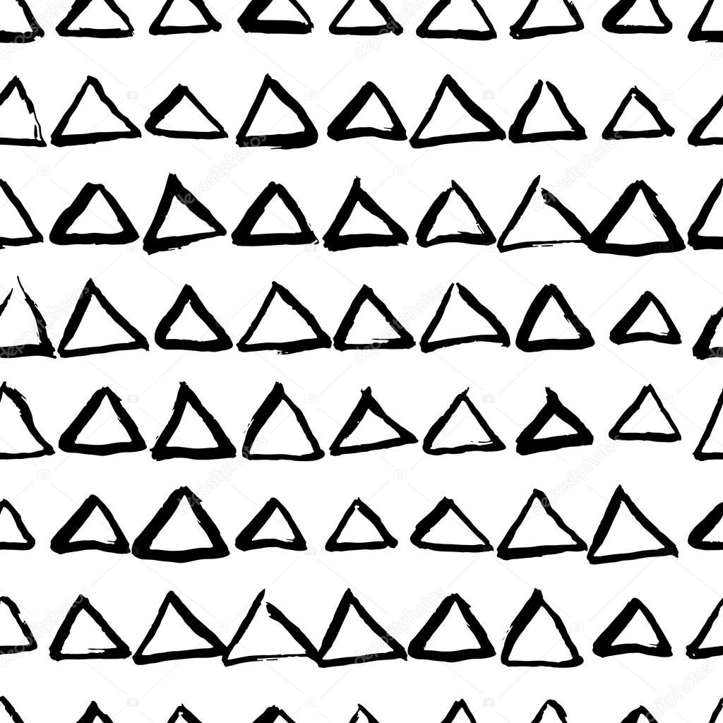 Vector abstract hand drawn seamless triangle pattern. Black and white doodle universal background made with watercolor, ink and marker. Trendy scandinavian design for fashion textile print.