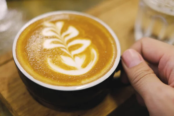 Man Hand Catch Hot Latte Coffee — Stock Photo, Image
