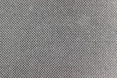 Gri ve yatay dikişli kumaş desenli bir arka plan. Boşluğu kopyala