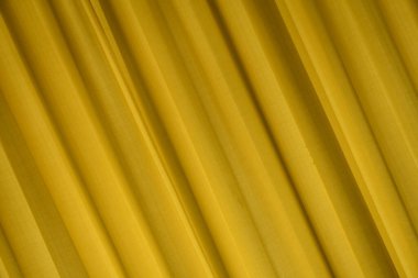 İpek kumaş, sarı renk. Dokuların toplanması, ince bir çizgi, yumuşak ipek desen. arkaplan, desen, desen, doku,