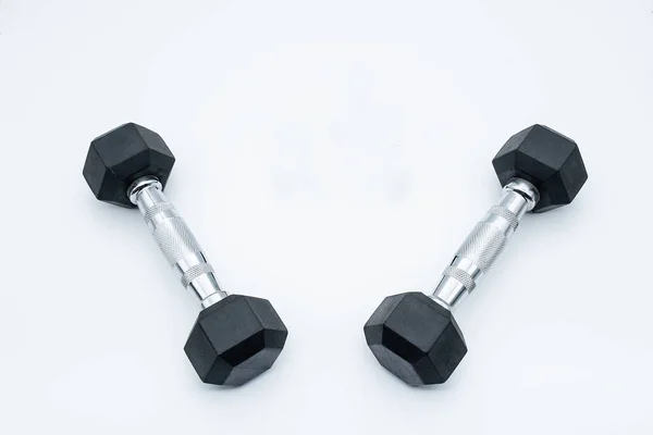 Isolated dumbbells for sports training — Stock Photo, Image