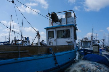 Abstract Composition of Fishing Boat and Harbor Elements.
