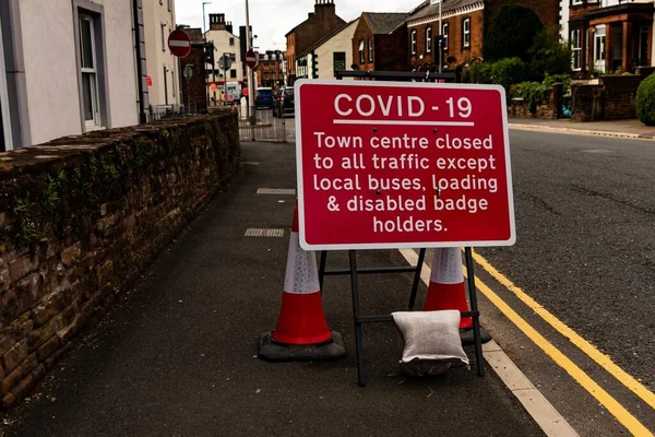 A road closure sign for Covid-19 social distancing measures in Penrith Cumbria