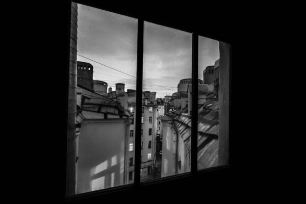 Misterious night roofs at Sadovaya street, downtown, Saint-Petersburg, Russia, black and white