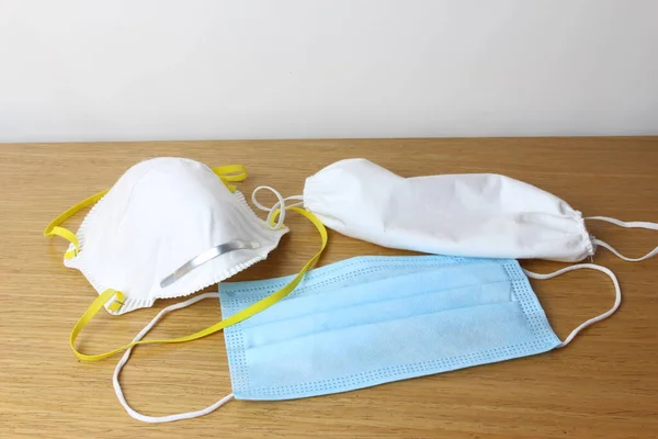 Group of masks for surgical protection and protection from dust, white fabric.