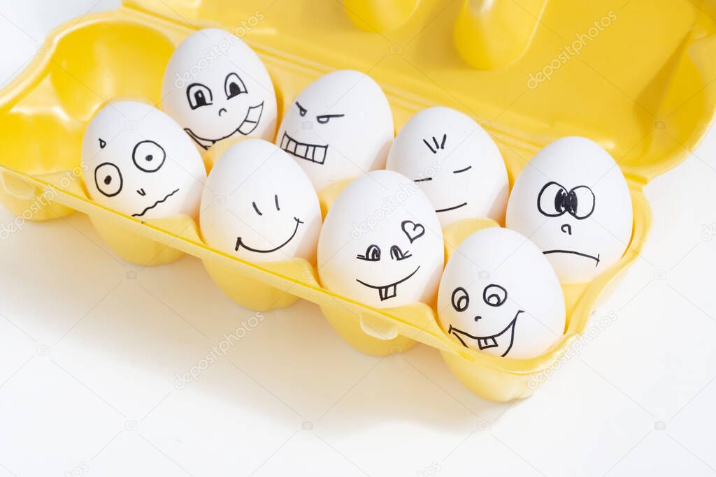 set of funny eggs with painted faces