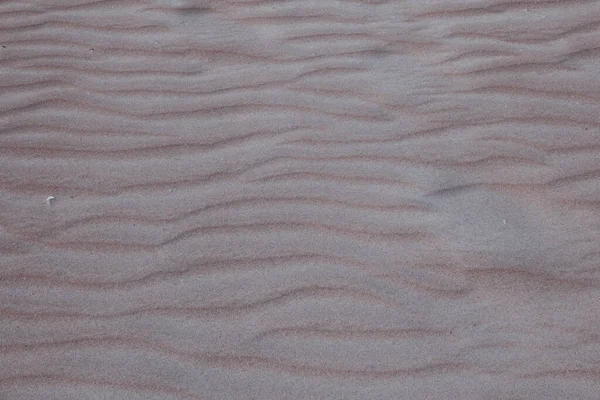 Strand zand textuur en patroon achtergrond pastel — Stockfoto