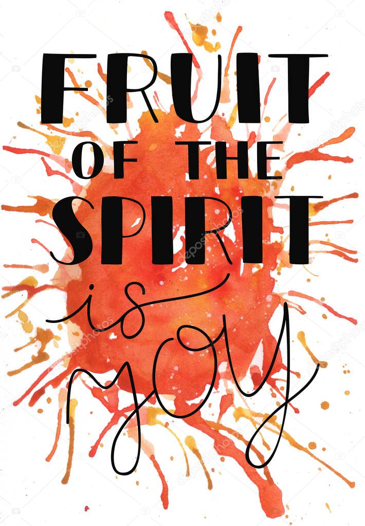 Hand lettering The fruit of the spirit is joy on watercolor background