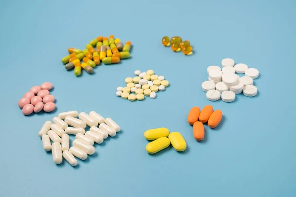 Close Many Different Pills Blue Background — Stock Photo, Image