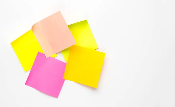 Set of colorful note stickers on white background.