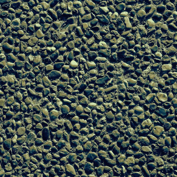 Textura Abstracta Una Pared Forrada Con Piedras Pequeñas Foto Monocromática —  Fotos de Stock