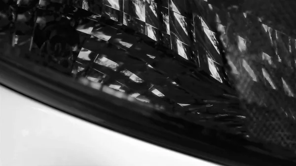 Abstraktes Bild Von Dunkelgrünen Autoscheinwerfern Mit Komplizierten Winkeln — Stockfoto
