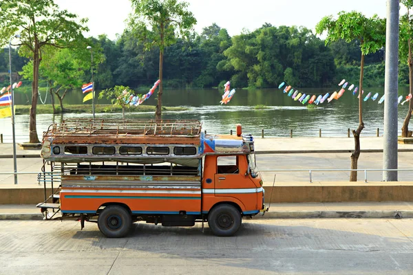 A mini bus waiting for passengers on a Photharam river in Ratchaburi Thailand
