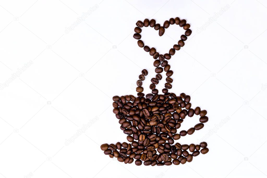 Close up picture of cup of coffee with the heart shaped steam in a  made of roasted beans on the white blackground.