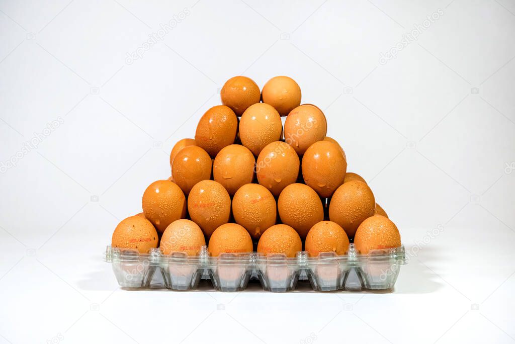 Egg pyramid at the white background.   Protein and vitamin source.  