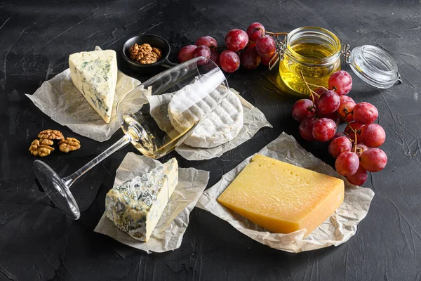 Assortment Cheeses Glass White Sauvignon Wine Honey Nuts Appetizer Selection — Stock Photo, Image