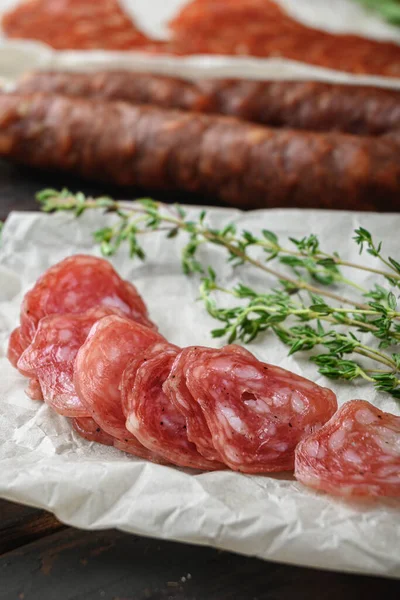 Variety Dry Cured Chorizo Fuet Other Sausages Cut Slices Herbs — Stock Photo, Image