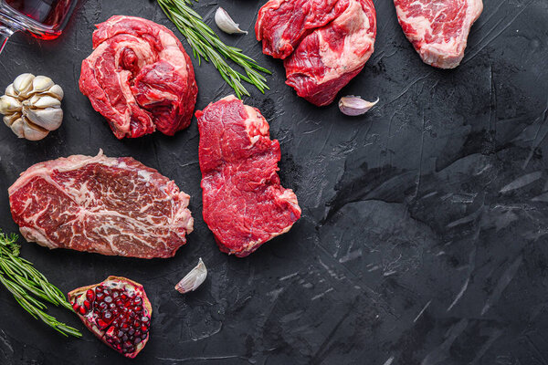 Alternative beef steak cuts with top blade, chuck roll and rump steak, top view with space for text