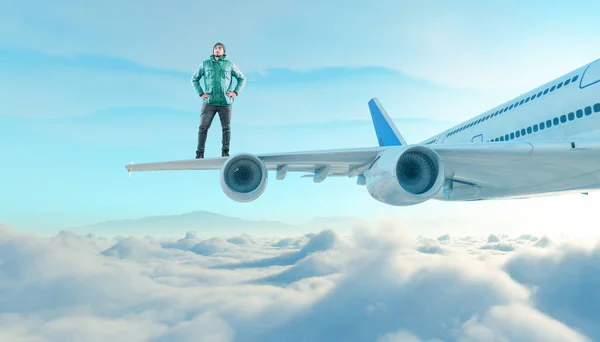 Young Man Stands Wing Plane Clouds — Stock Photo, Image