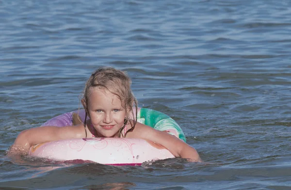 Little Lovely Blonde Girl Swims Sea Lifebuoy — Stock Photo, Image