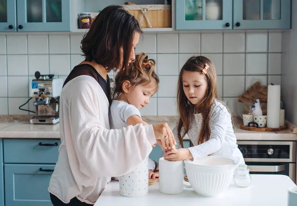 Happy family cook together in the kitchen — Stock Photo, Image
