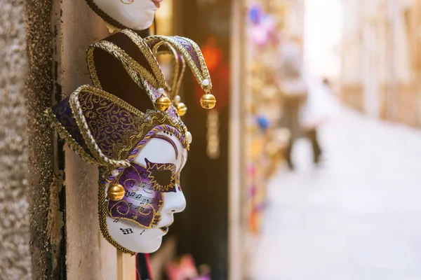 Traditional venetian mask in store on street