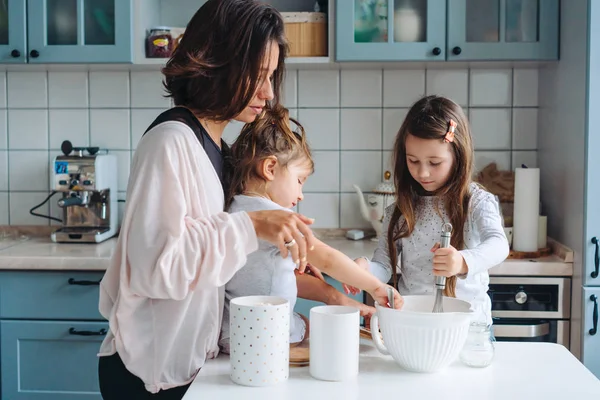 Happy family cook together in the kitchen