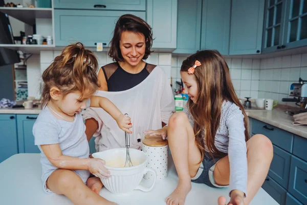 Happy family cook together in the kitchen — Stock Photo, Image