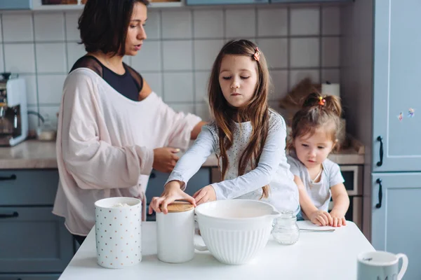 Happy family cook together in the kitchen — Stock Photo, Image